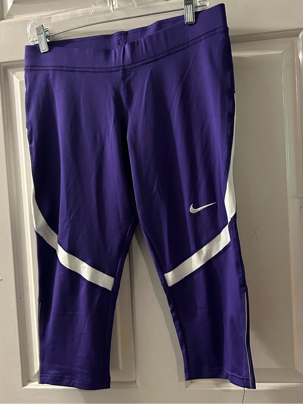 Nike Purple Capri Leggings with White Swoosh and Stripes